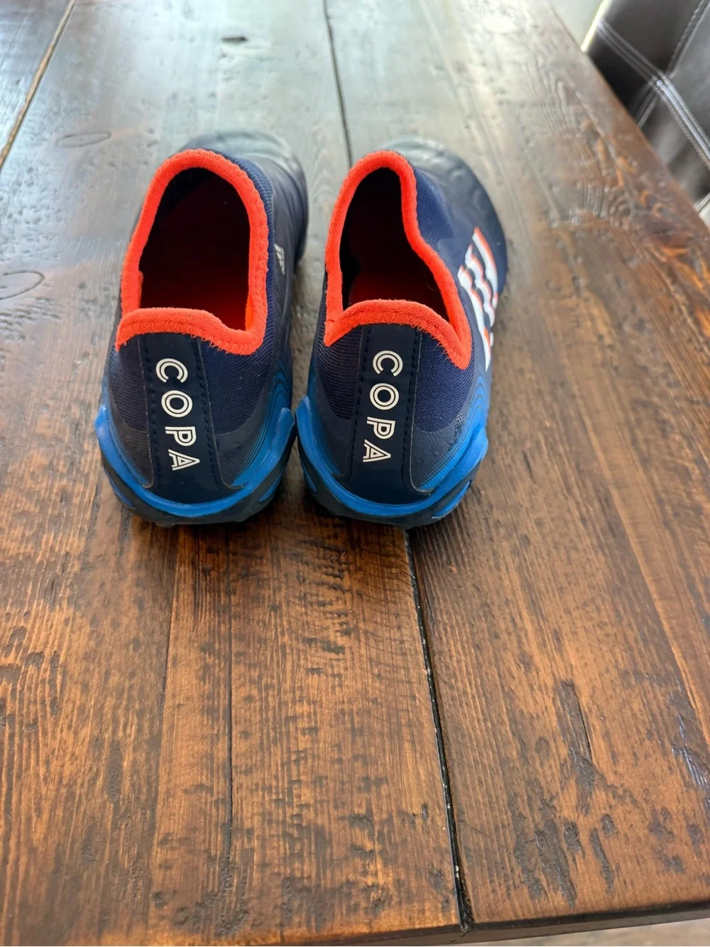 COPA adidas Navy Athletic Soccer Shoes with Orange Trim